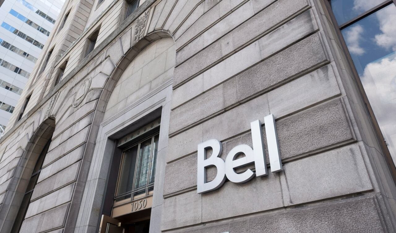 default-494 A Bell logo on a stone building.